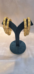 Microplated gold bangles